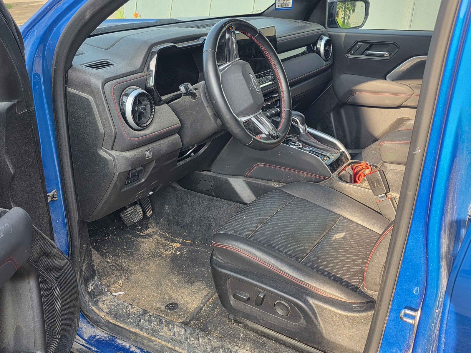 Driver&rsquo;s floor and seat area before Riverstone Deep Clean detail