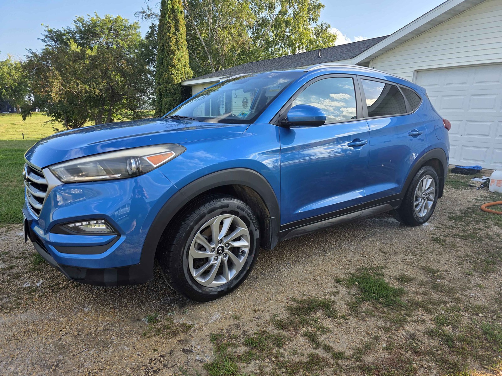 Blue SUV exterior after a Riverstone detail